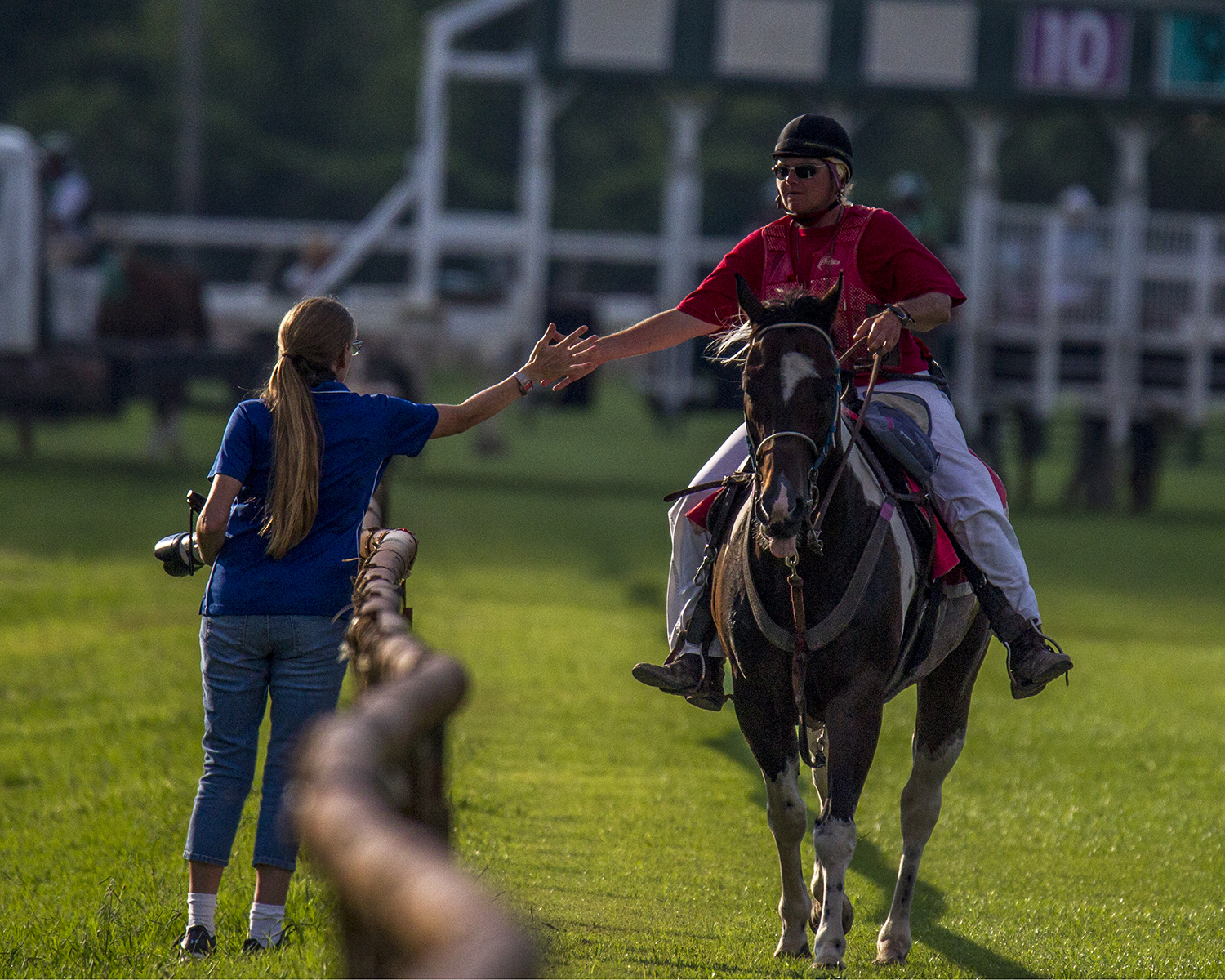 "High Five" (Louisiana Downs, Bossier City, LA - July 18, 2017), photograph by Sam Switalski