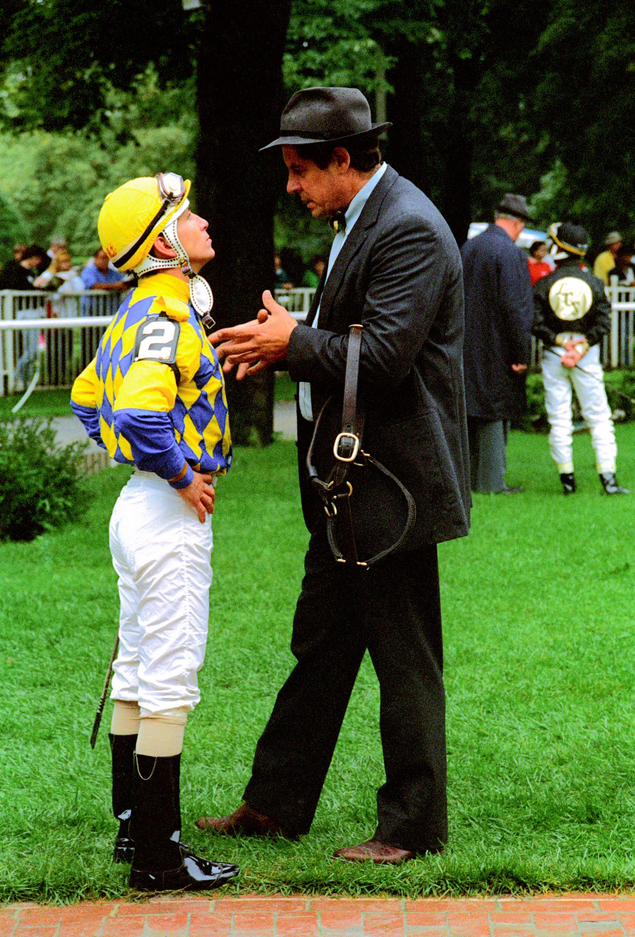 "Chris Antley/ Richard “Dickie” Small Paddock Prior to Woodward Stakes, 1993" (Belmont Park, Elmont, NY - 1993), photograph by Lynn Grabowski