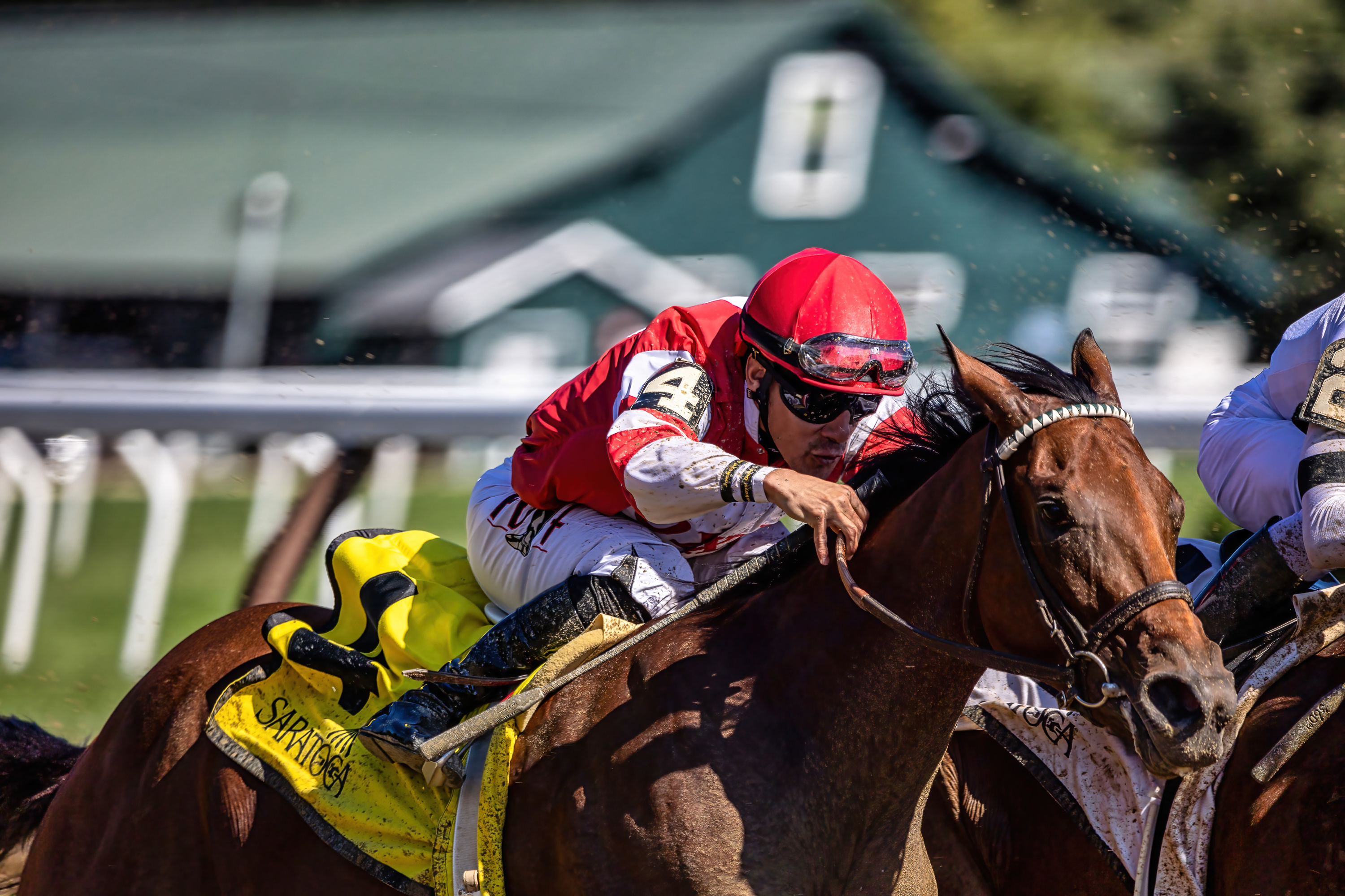 "Red Silks #4" (Saratoga Race Course, Saratoga Springs, NY - July/August 2022 Season), photograph by Marc Jacobs	