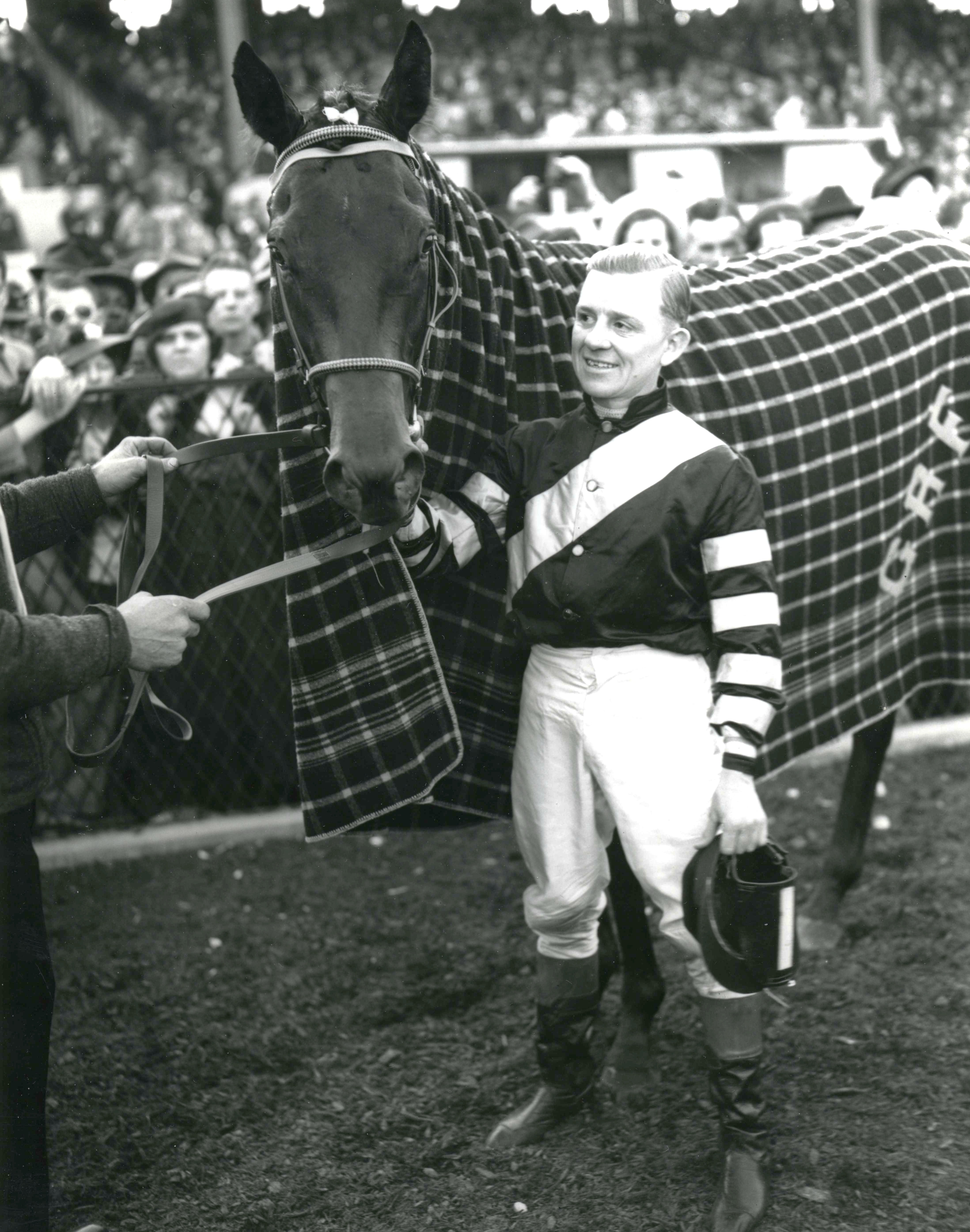 War Admiral with jockey Charles Kurtsinger after winning the 1937 Preakness at Pimilico (Keeneland Library Morgan Collection/Museum Collection)