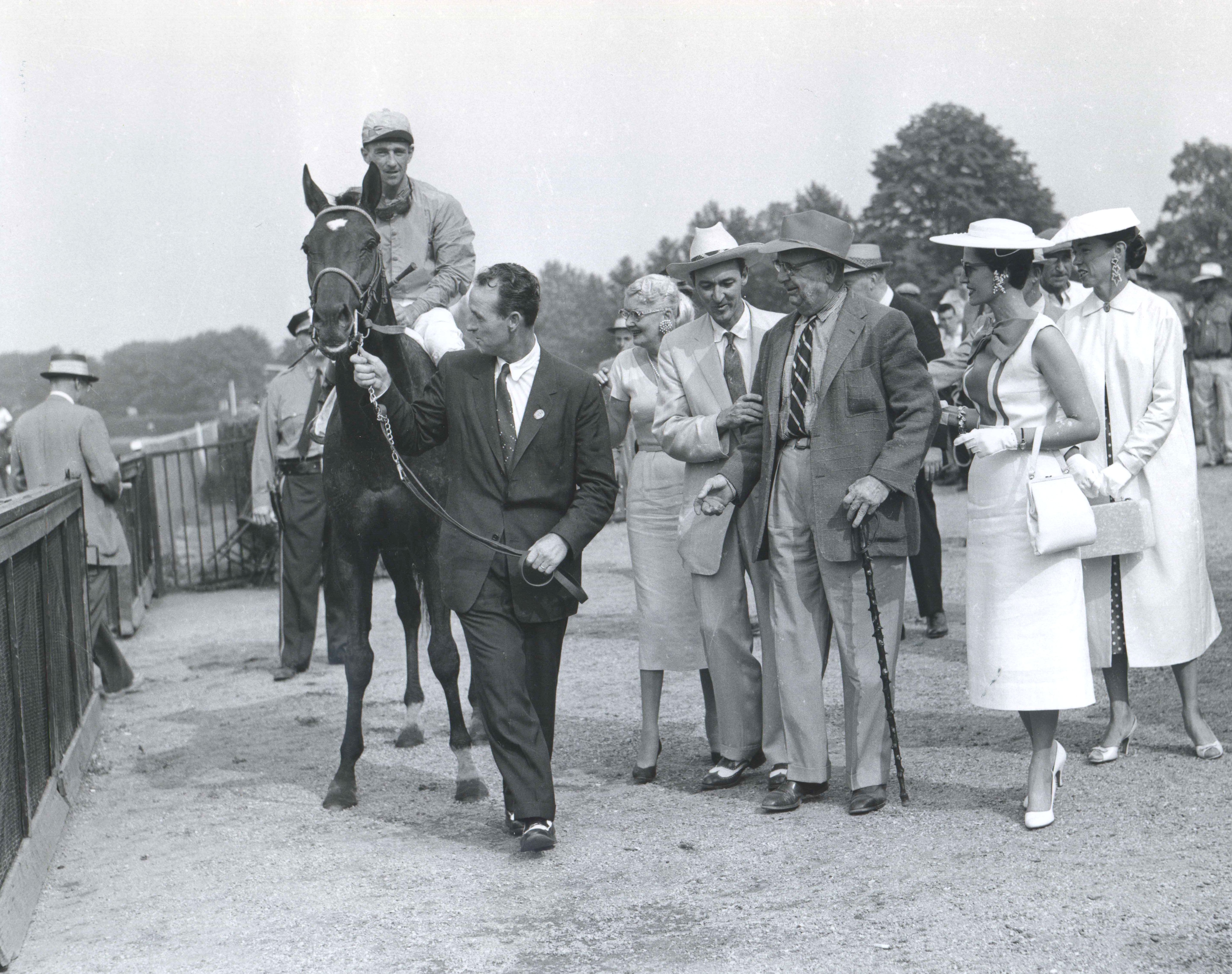 Needles (Dave Erb up) on his way to the winner's circle after winning the 1956 Belmont Stakes (Keeneland Library Morgan Collection/Museum Collection)