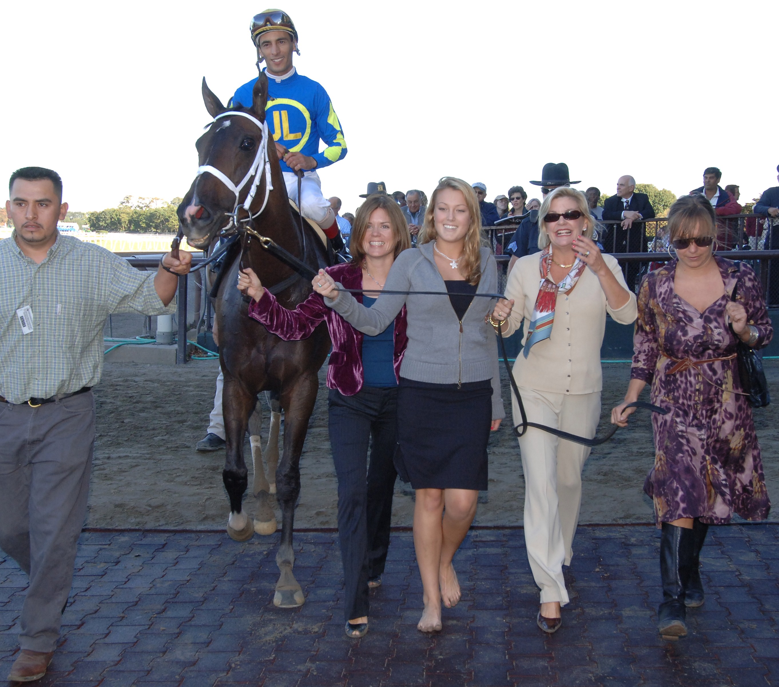 Ashado being led to the winner's circle after winning the 2005 Beldame at Belmont Park (NYRA)