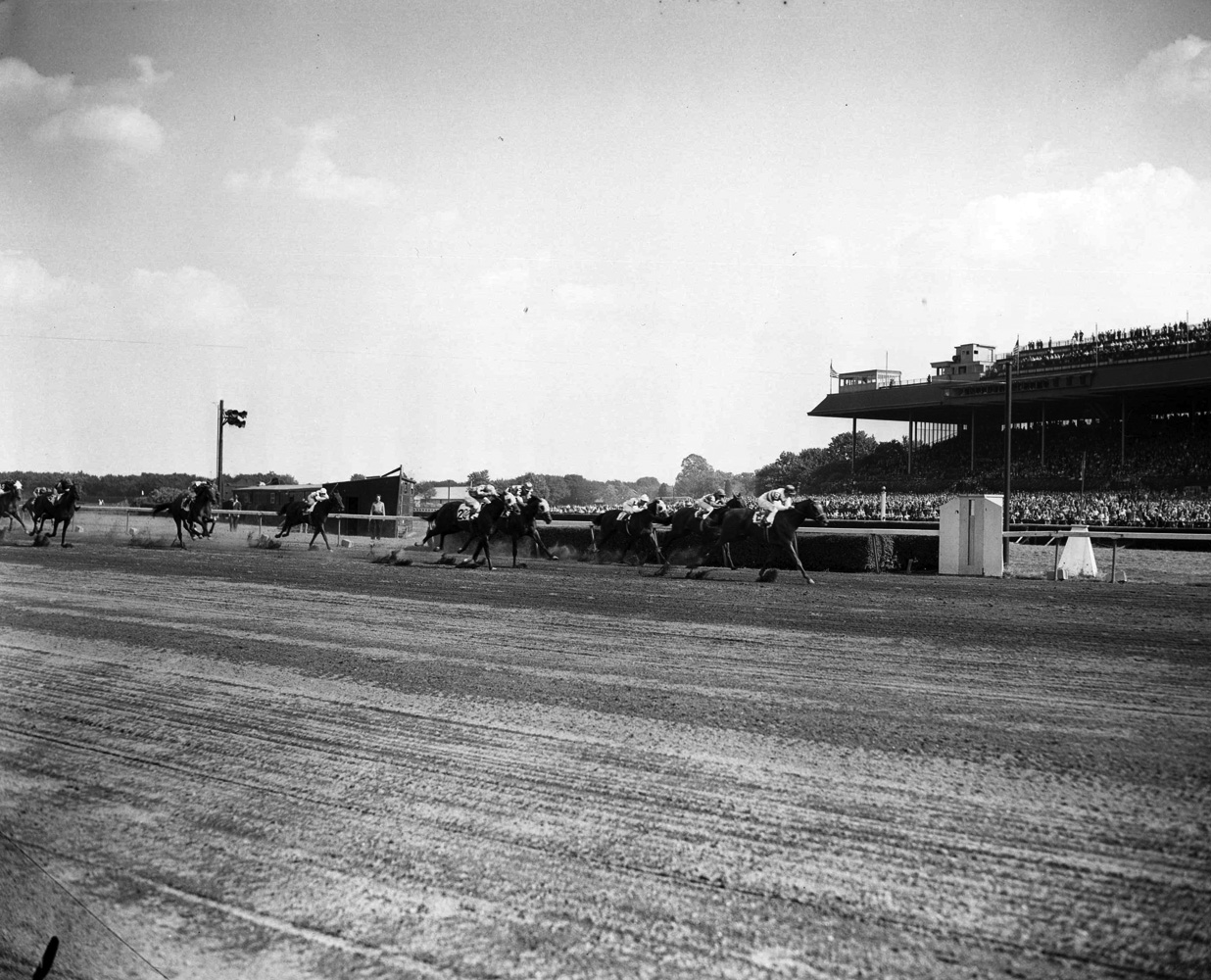 Busher (Eddie Arcaro up) racing to victory in the 1944 Adirondack at Belmont Park (Keeneland Library Morgan Collection/Museum Collection)