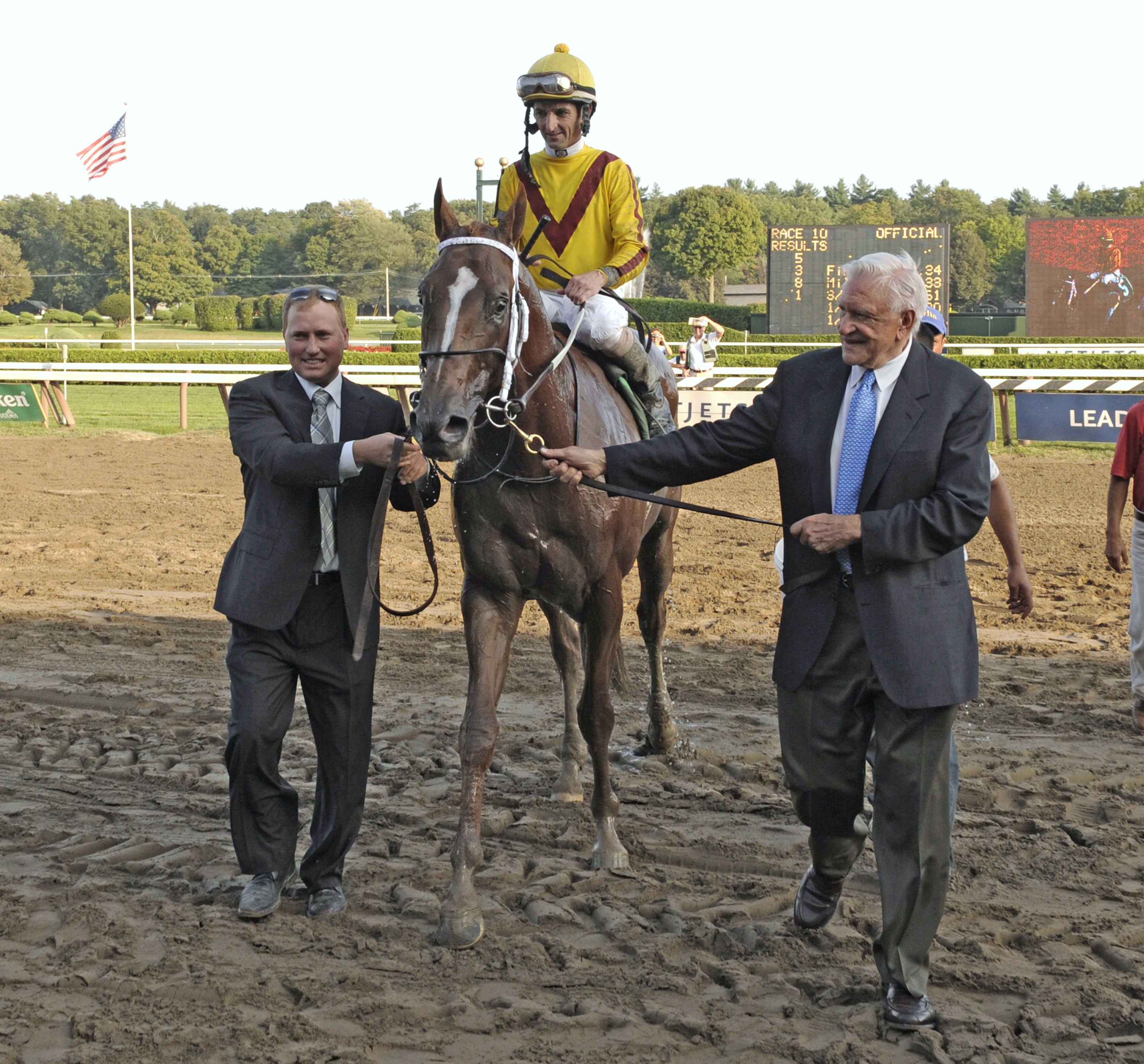 Curlin being led to the winner's circle after winning the 2008 Woodward at Saratoga Race Course (Skip Dickstein)