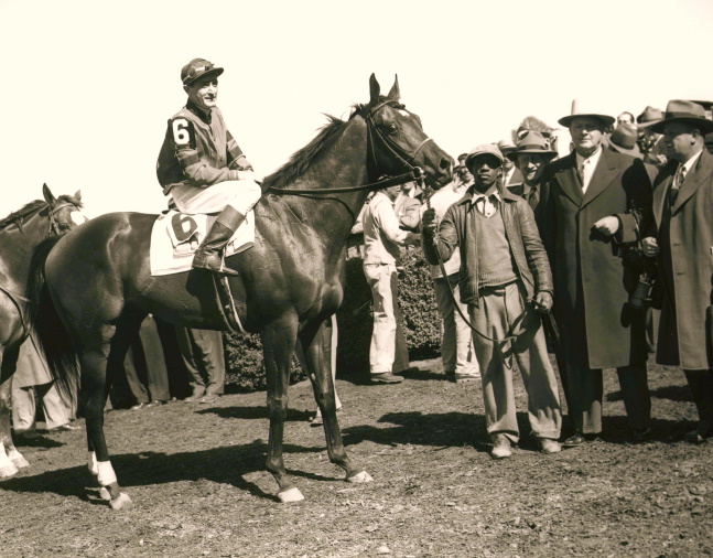 Coaltown in the winner's circle with Hall of Fame trainers Ben and Jimmy Jones for the 1948 Swift Stakes at Belmont Park (Keeneland Library Morgan Collection/Museum Collection)