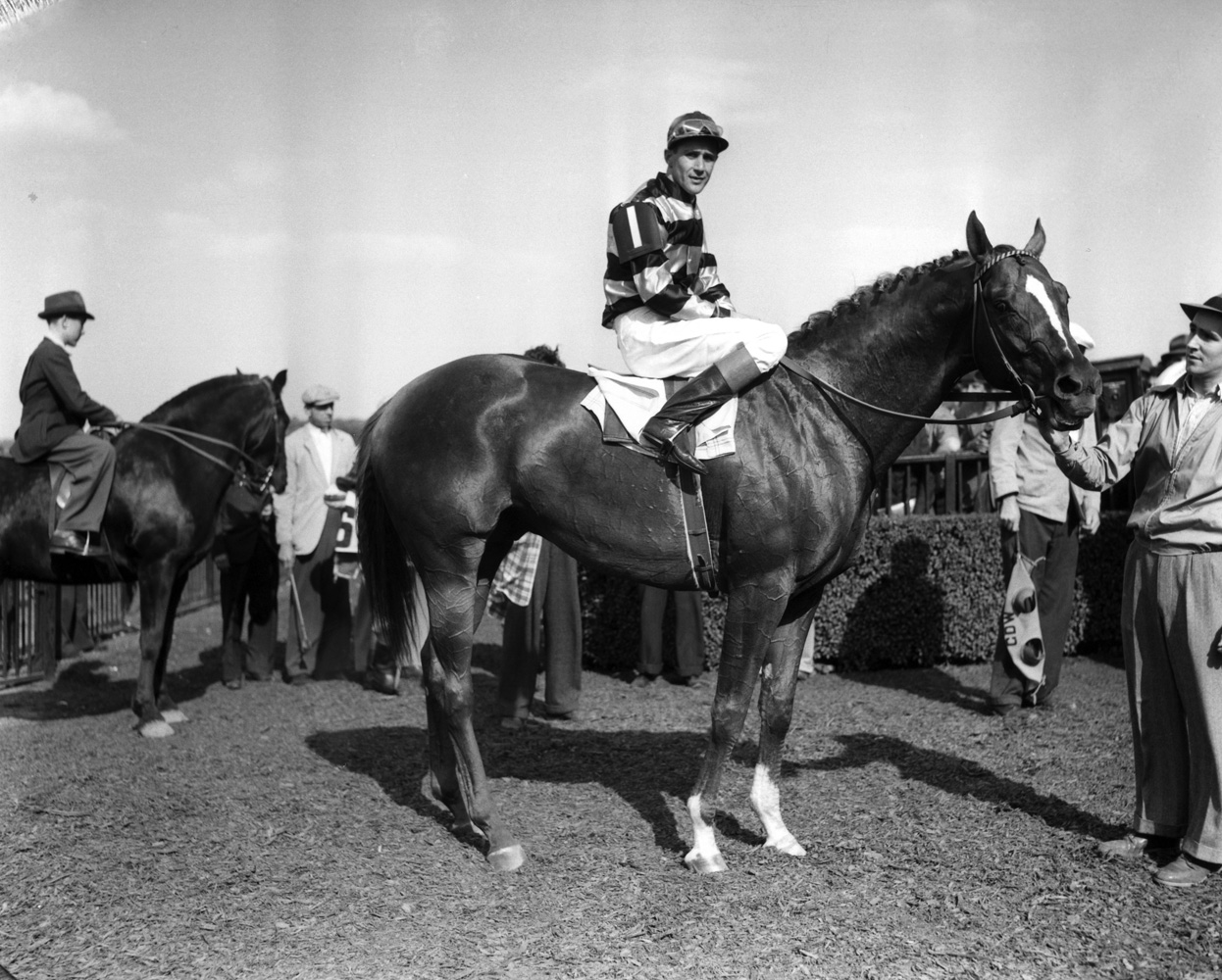 Eight Thirty (Harry Richards up) in the winner's circle for the 1941 Metropolitan Handicap at Belmont Park (Keeneland Library Morgan Collection/Museum Collection)