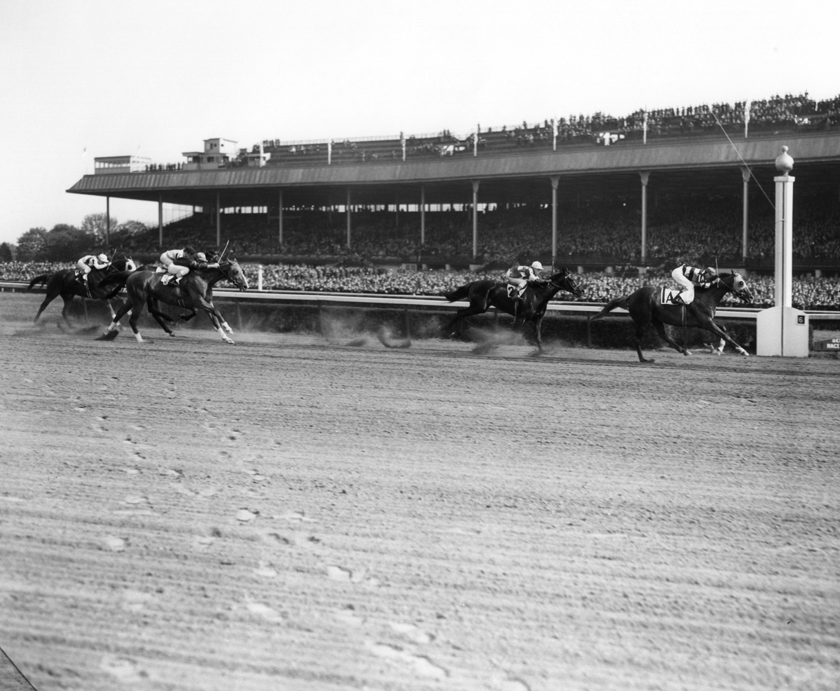 Eight Thirty (Harry Richards up) winning the 1940 Toboggan Handicap at Belmont Park (Keeneland Library Morgan Collection/Museum Collection)