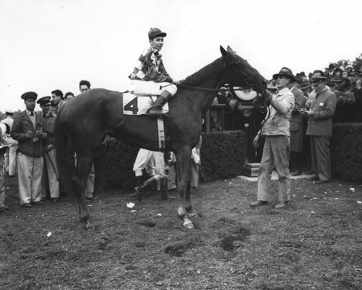 Gallorete with Job D. Jessop up in the winner's circle for the 1946 Metropolitan (Keeneland Library Morgan Collection/Museum Collection)