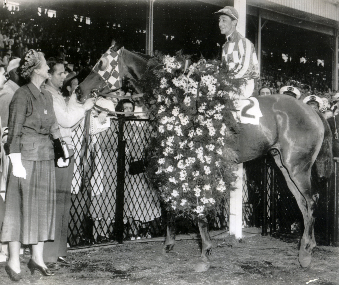 Hill Prince (Eddie Arcaro up) with Mrs. C. T. Chenery in the winner's circle for the 1950 Preakness at Pimlico (AP Wire Photo/Museum Collection)