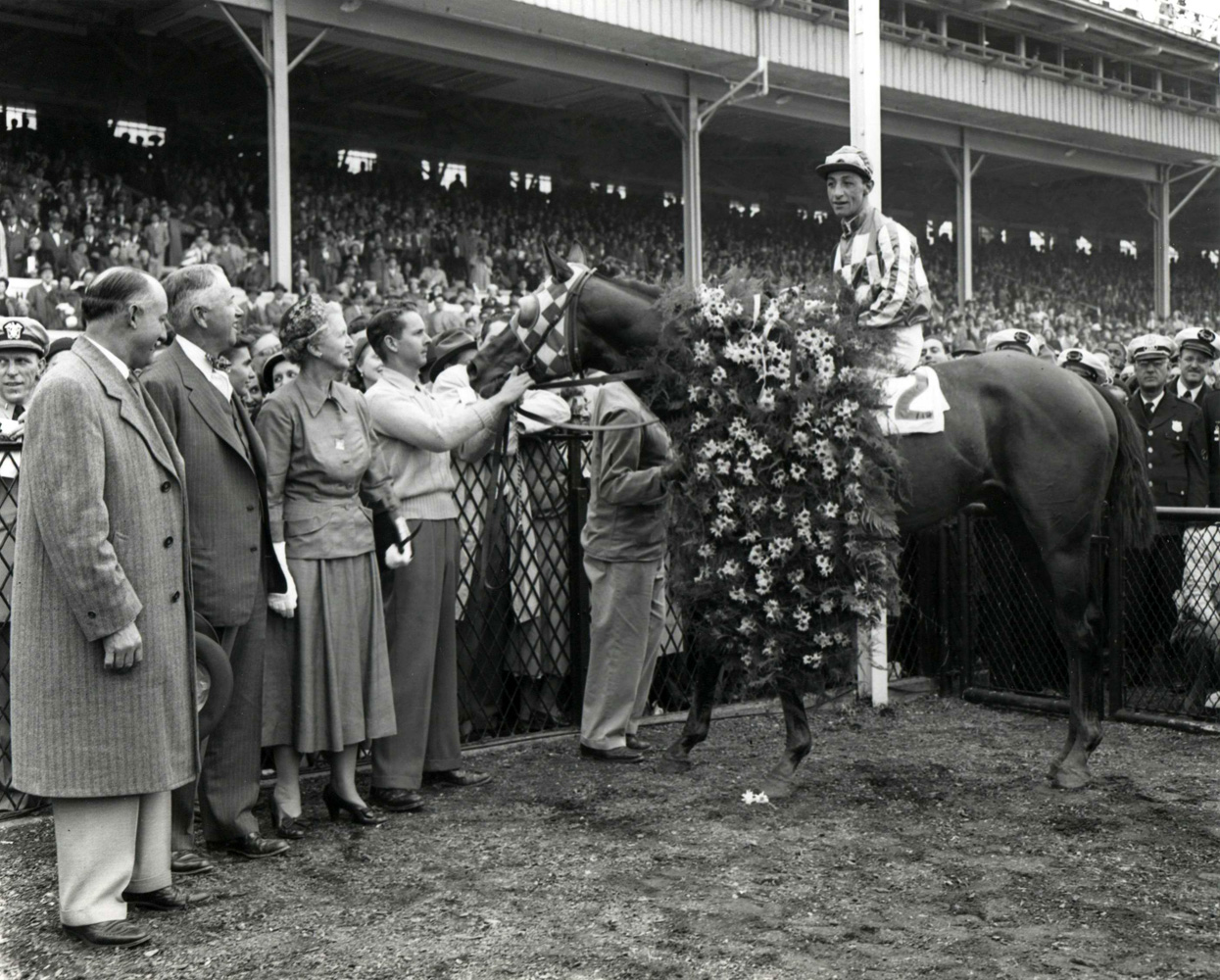Hill Prince (Eddie Arcaro up) in the winner's circle for the 1950 Preakness at Pimlico Race Course (Keeneland Library Morgan Collection/Museum Collection)