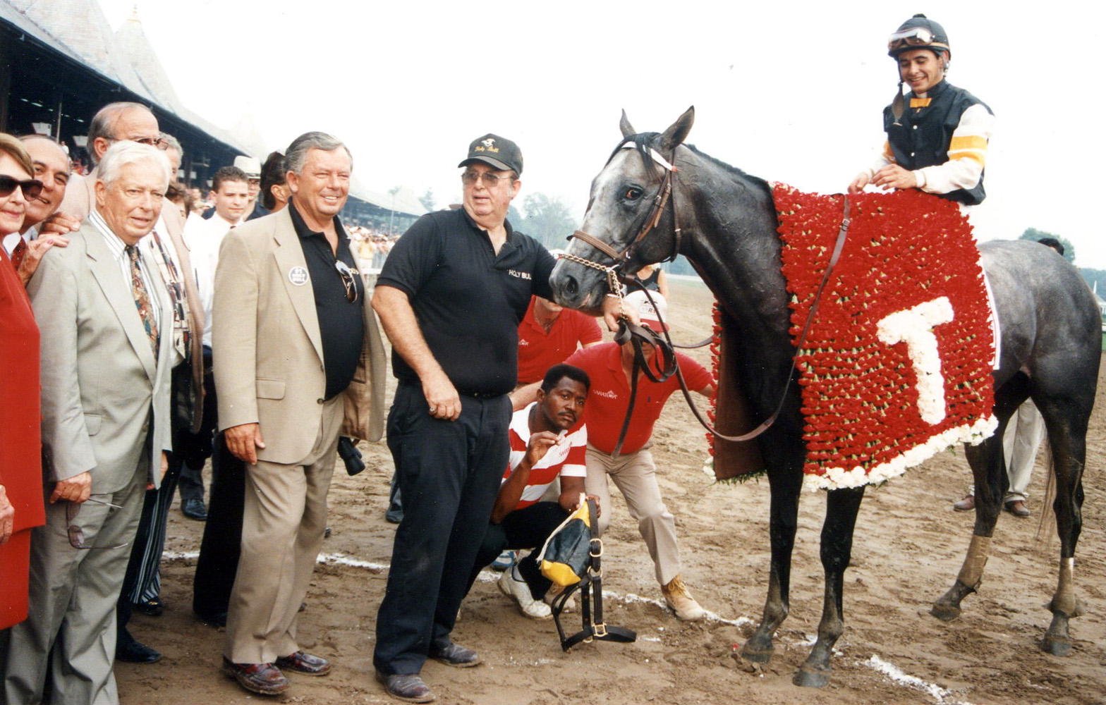 Holy Bull (Mike Smith up) in the winner's circle for the 1994 Travers Stakes (Barbara D. Livingston/Museum Collection)