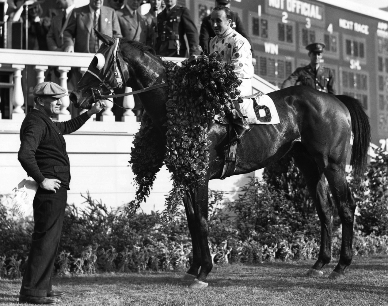 Johnstown (James Stout up) in the winner's circle for the 1939 Kentucky Derby (Churchill Downs Inc./Kinetic Corp. /Museum Collection)