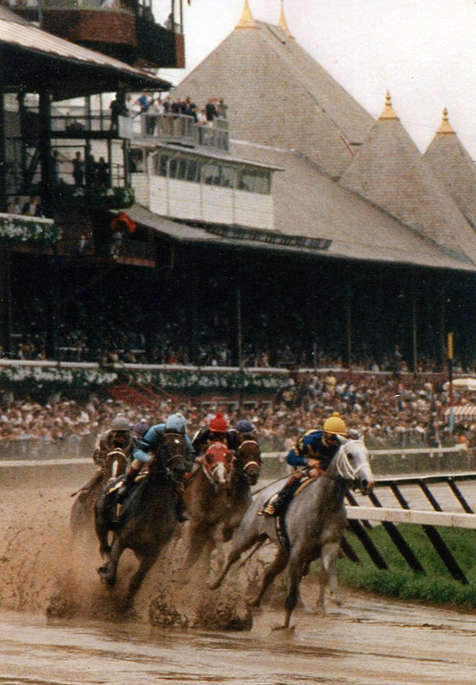 Lady's Secret (Pat Day up) leading at the first turn in the 1986 Whitney at Saratoga (Mike Pender/Museum Collection)