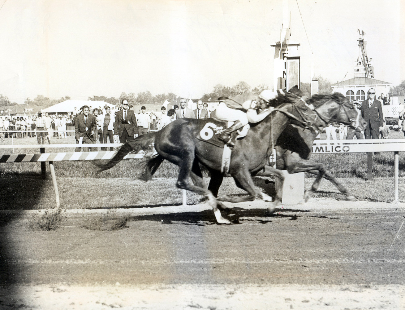 Majestic Prince (Bill Hartack up) defeating fellow future Hall of Famer Arts and Letters (Braulio Baeza up) by a head in the 1969 Preakness (Museum Collection)