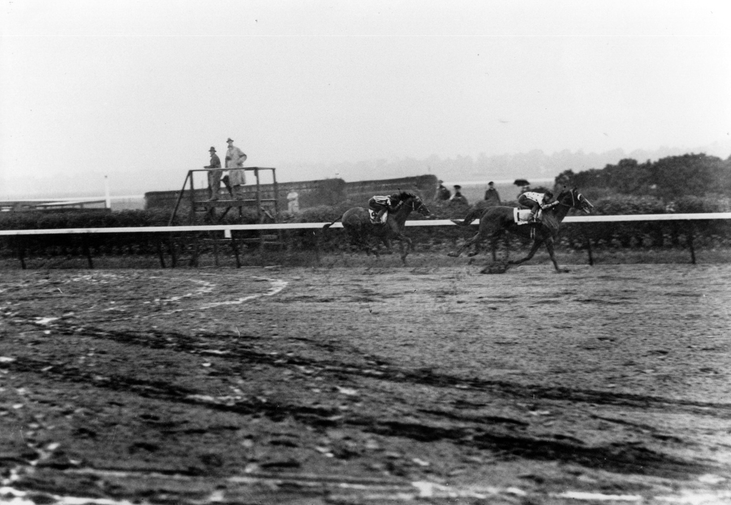 Omaha (Willie Saunders up) winning the 1935 Belmont Stakes and becoming America's third Triple Crown winner (Keeneland Library Cook Collection/Museum Collection)