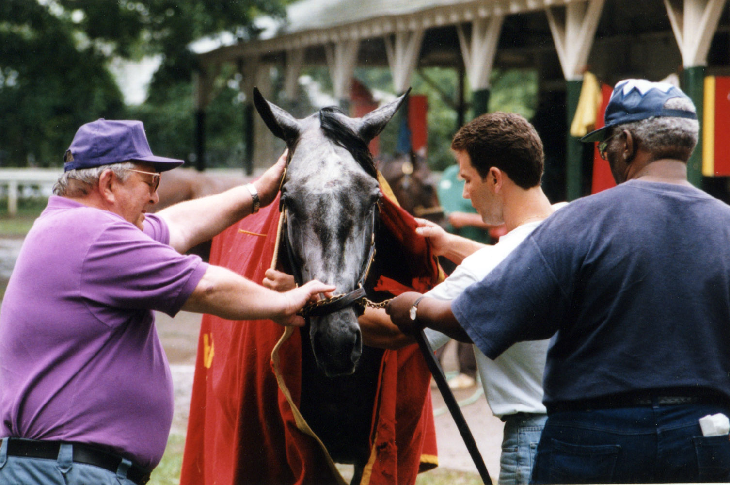 Skip Away with trainer Sonny Hine at Saratoga, 1998 (Mike Pender/Museum Collection)