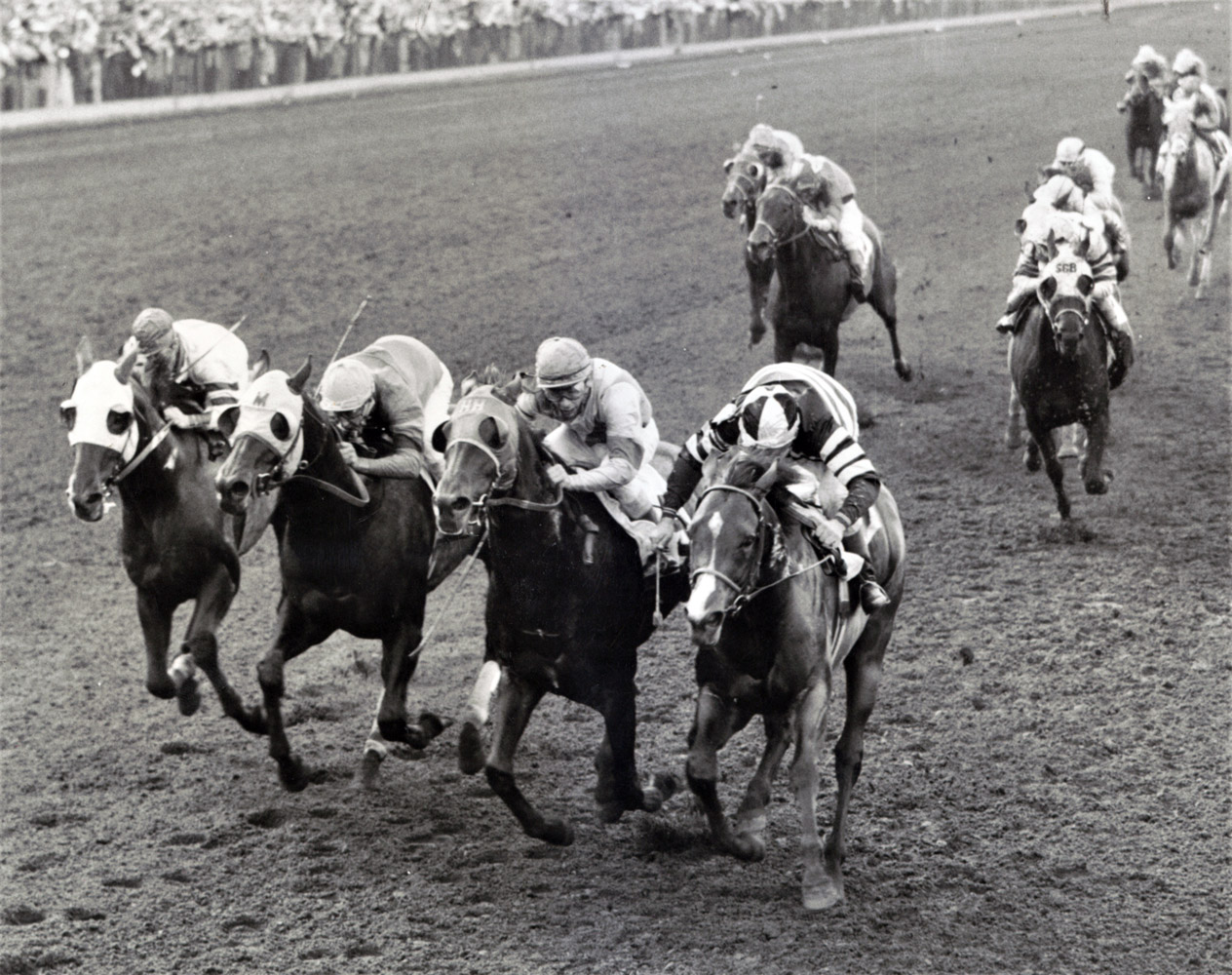 Swoon's Son with Dave Erb up (on the right) winning the 1957 Citation Handicap at Washington Park (Keeneland Library Thoroughbred Times Collection)