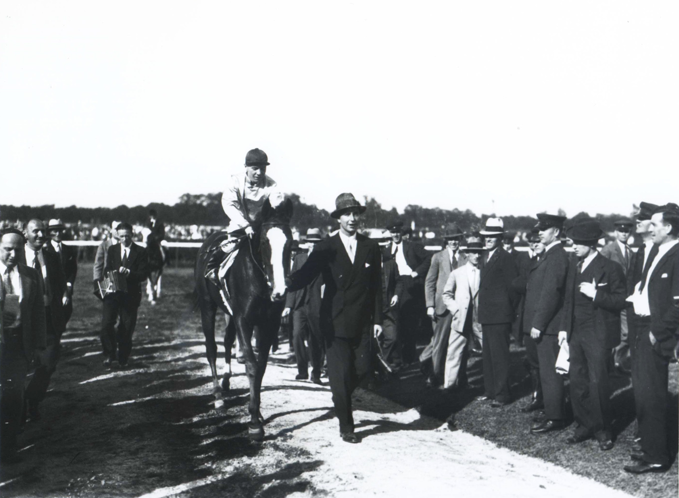 Top Flight (Raymond Workman up) entering the winner's circle with owner C. V. Whitney (Keeneland Library Cook Collection/Museum Collection)