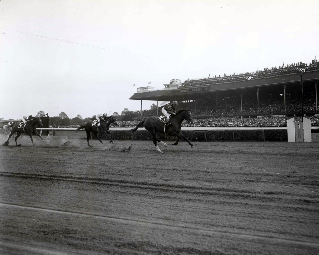 Two Lea (Niebold Pierson up) winning her first career race at Belmont Park, September 1948 (Keeneland Library Morgan Collection/Museum Collection)