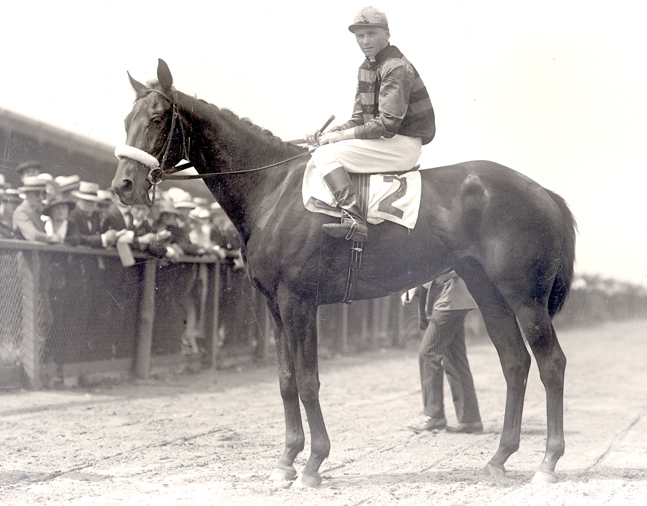 Billy Kelly (Earl Sande up) on the racetrack (Keeneland Library Cook Collection)