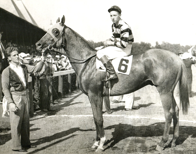 Eight Thirty (Wayne Wright up) in the winner's circle for the 1938 Flash Stakes at Saratoga (TurfPix/Museum Collection)