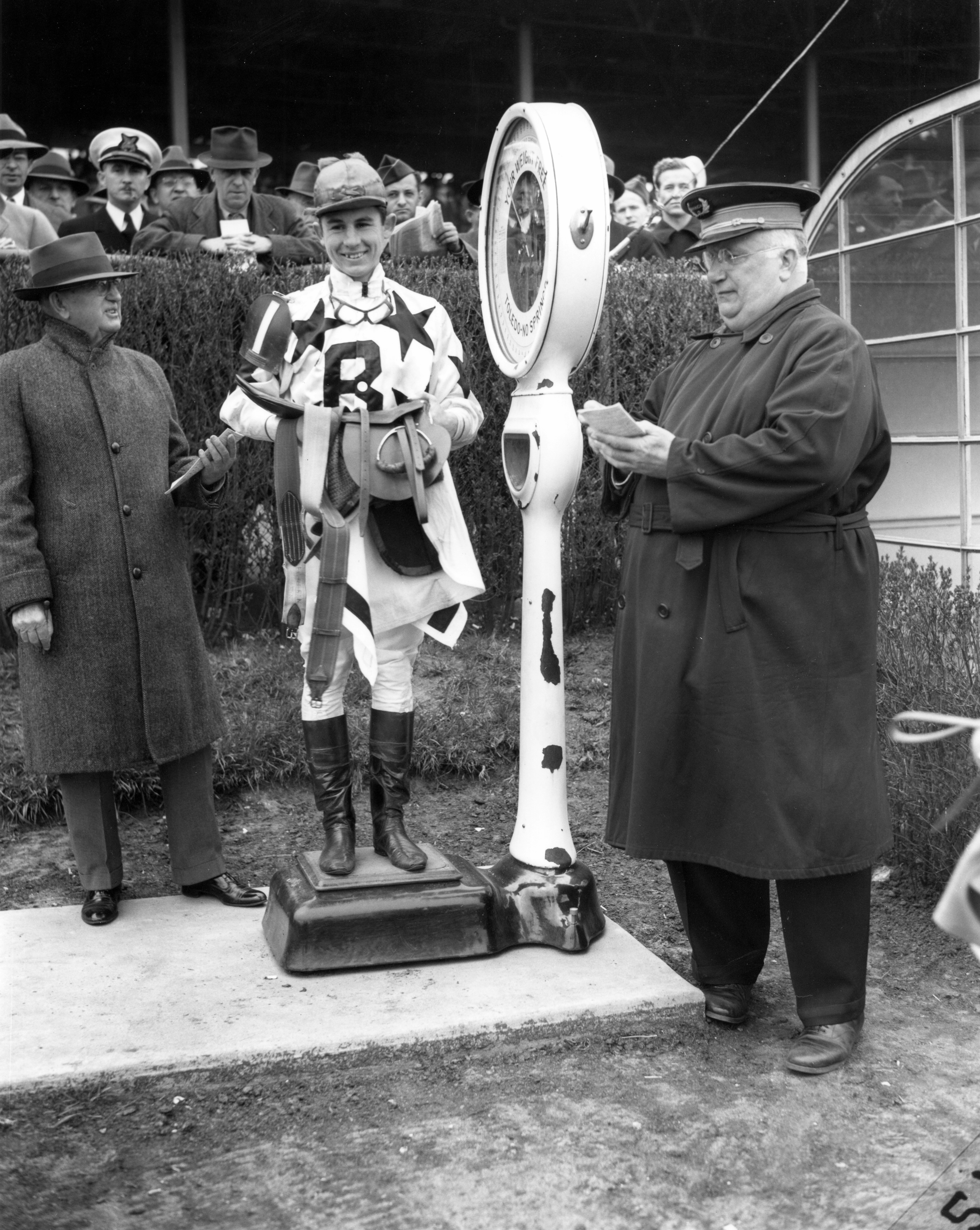 Eric Guerin weighing in at Jamaica, May 1944 (Keeneland Library Morgan Collection/Museum Collection)