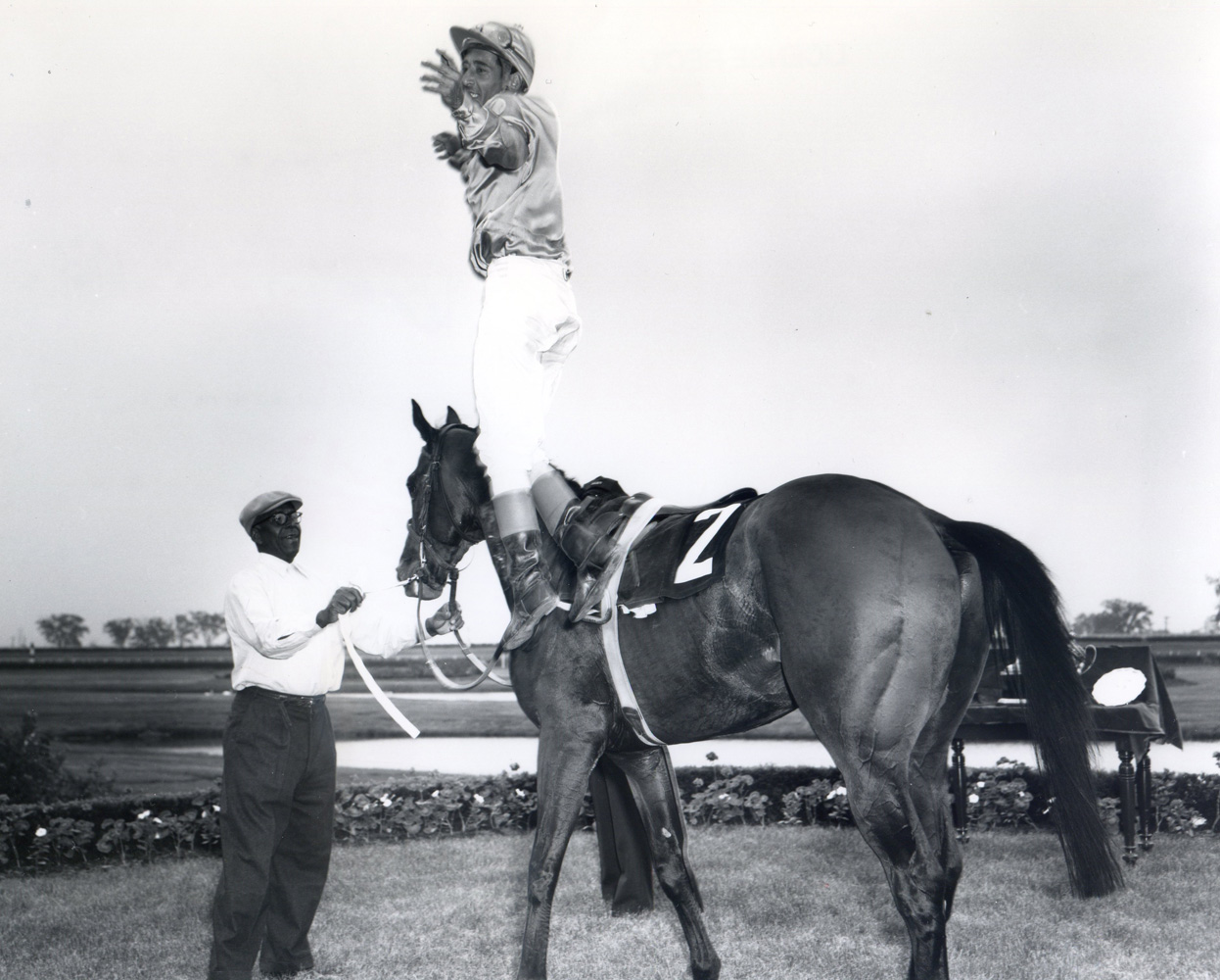 Avelino Gomez jumping off Victoria Park after winning the 1960 Queen's Plate at Woodbine (Michael Burns/Museum Collection)