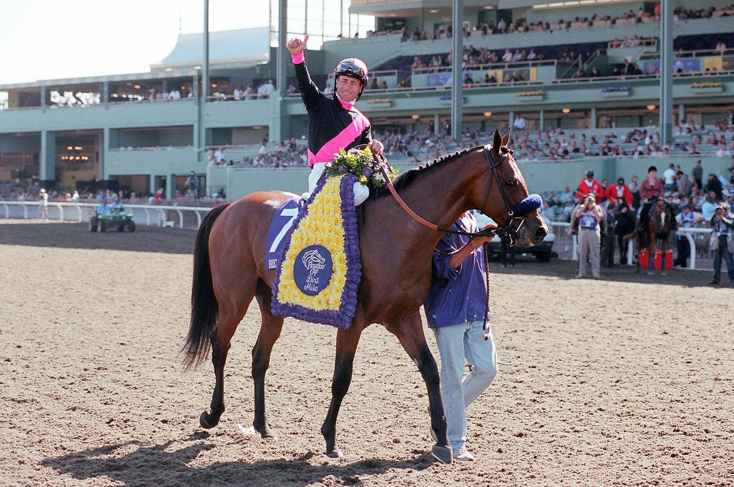 Garrett Gomez celebrating after winning the 2008 Breeders' Cup Dirt Mile with Albertus Maximus at Santa Anita (Bill Mochon/Museum Collection)