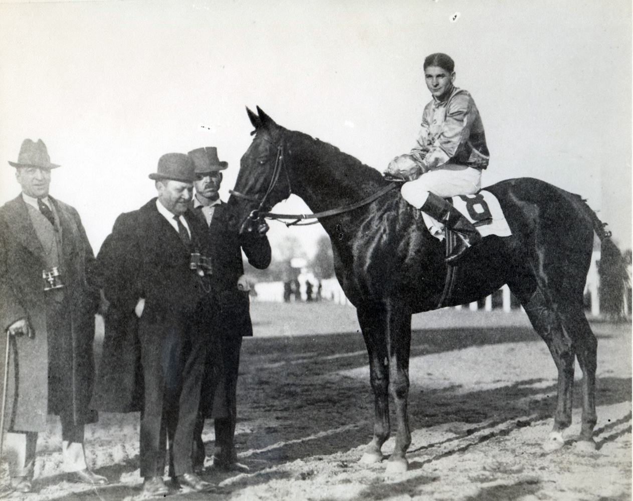 Albert Johnson and Morvich in the winner's circle for the 1921 Pimlico Futurity (Museum Collection)