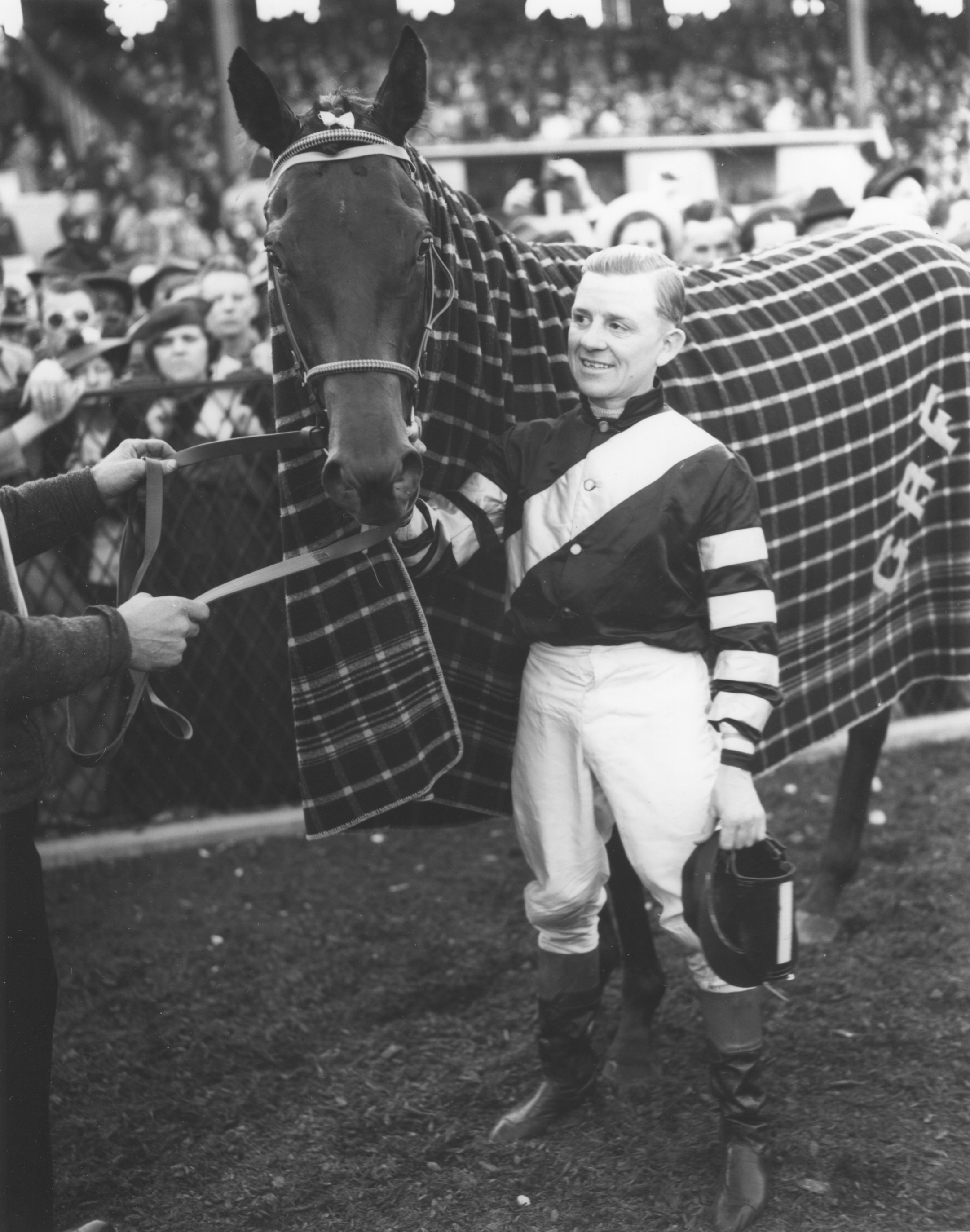 Charles Kurtsinger with War Admiral after winning the 1937 Preakness Stakes at Pimlico (Keeneland Library Morgan Collection/Museum Collection)