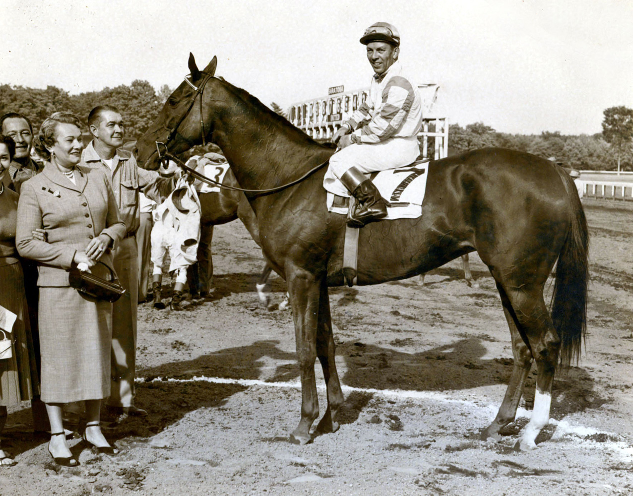 Conn McCreary and Lavender Hill in the winner's circle after winning the 1954 Diana Handicap at Saratoga (Museum Collection)