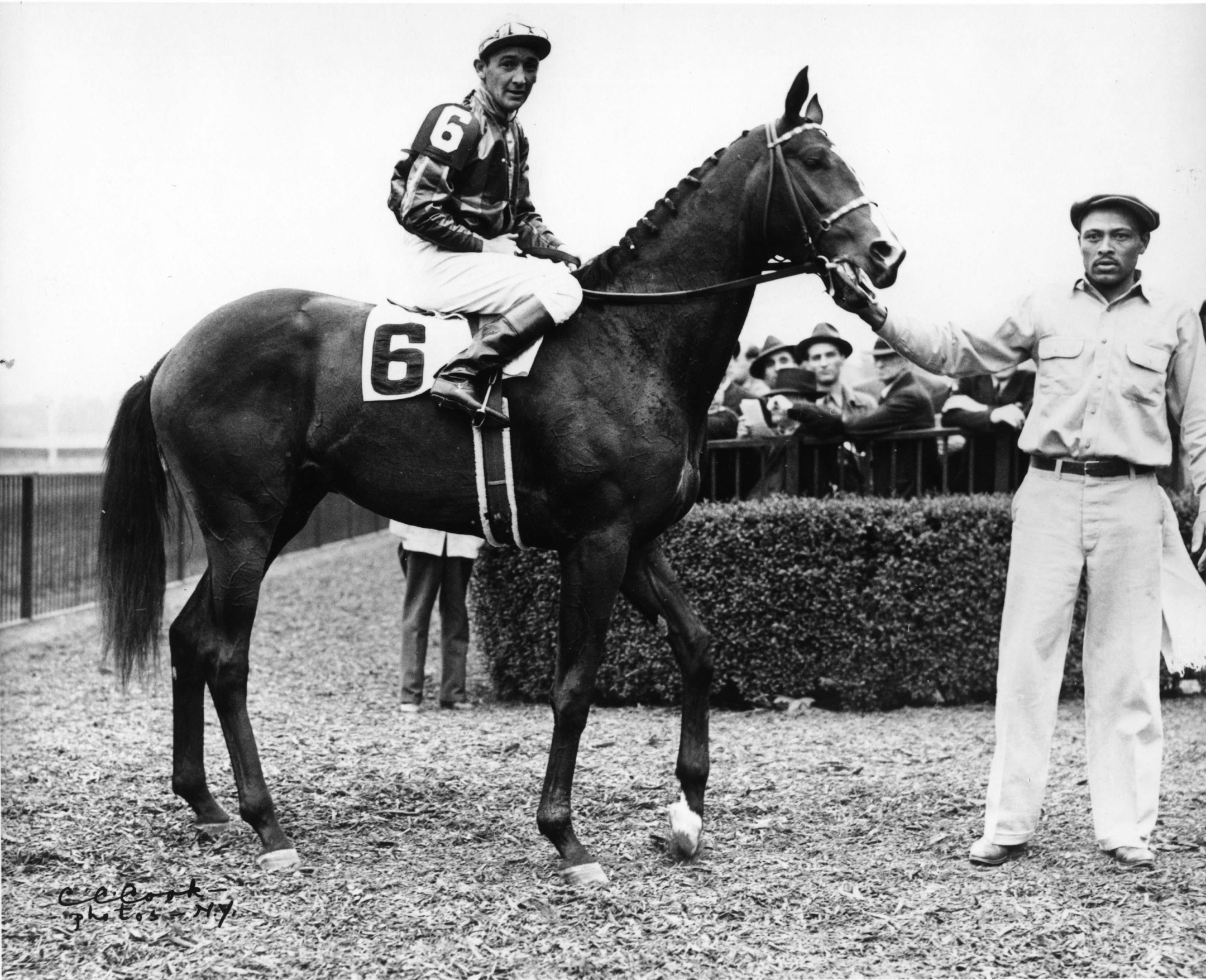 Alfred Roberston and Amphitheatre in the winner's circle at Belmont Park, May 1941 (Keeneland Library Cook Collection/Museum Collection)