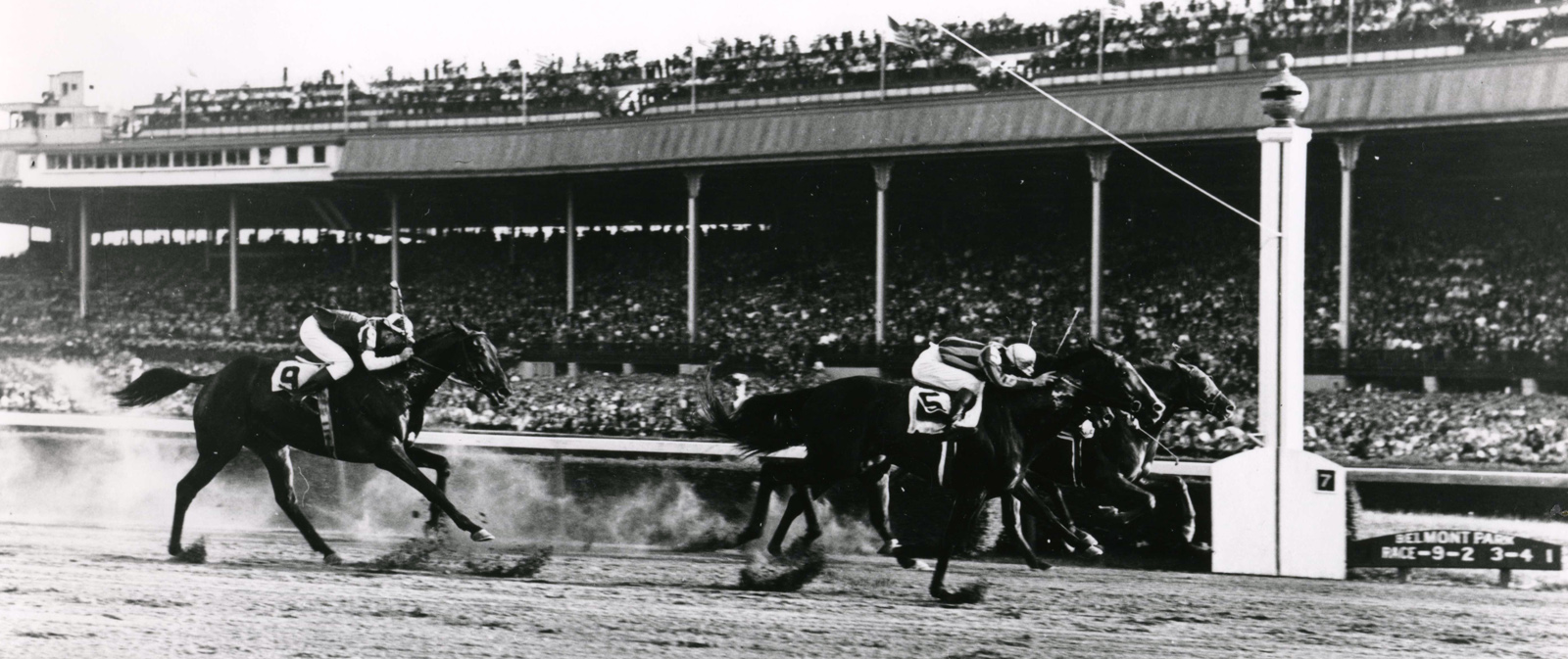 Alfred Robertson and Amphitheatre winning the 1941 Futurity Trial at Belmont (Keeneland Library Cook Collection/Museum Collection)