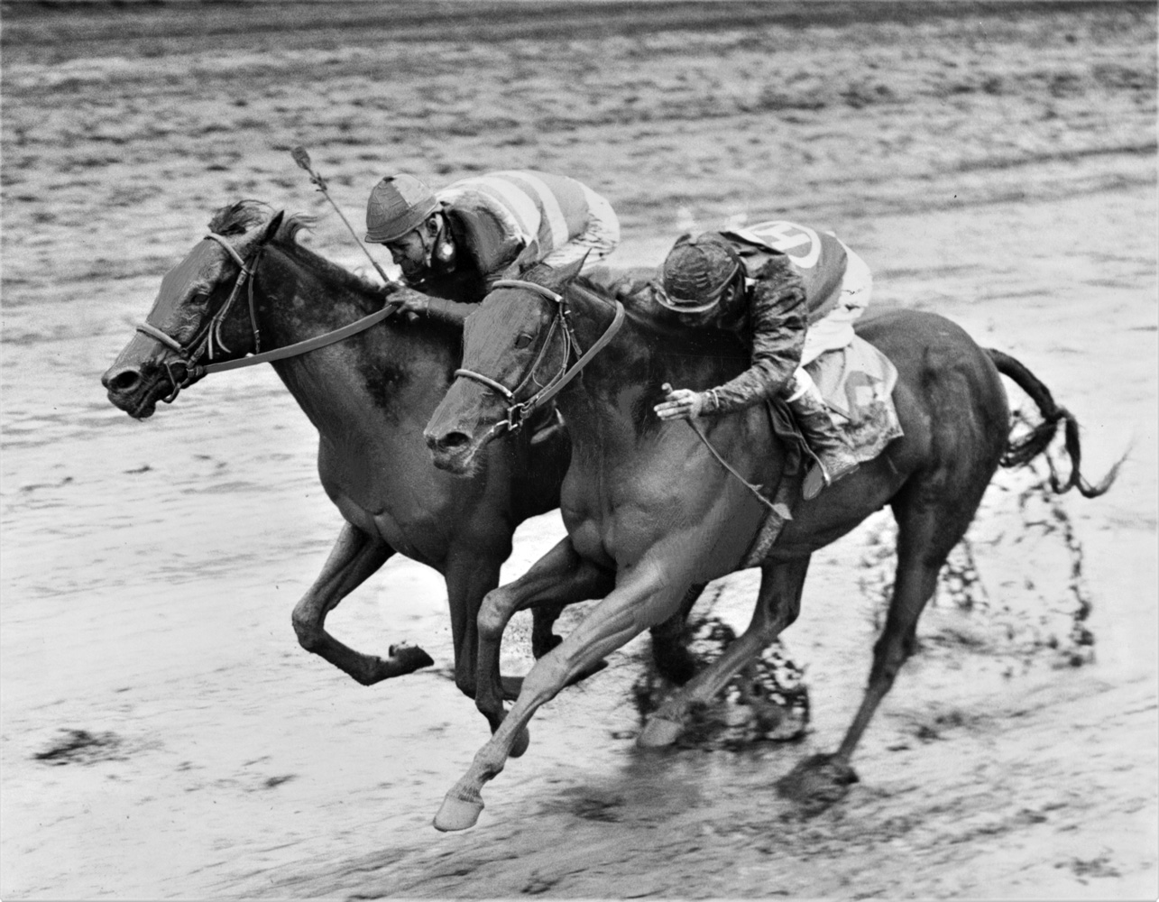 John Sellers and Carry Back (on the outside) winning the 1961 Florida Derby at Gulfstream Park (Jim Raftery Turfotos)