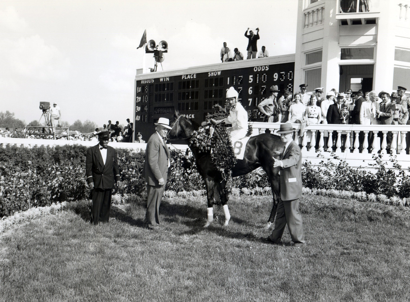 Bill Shoemaker and Tomy Lee in the winner's circle for the 1959 Kentucky Derby (Churchill Downs Inc./Kinetic Corp. /Museum Collection)