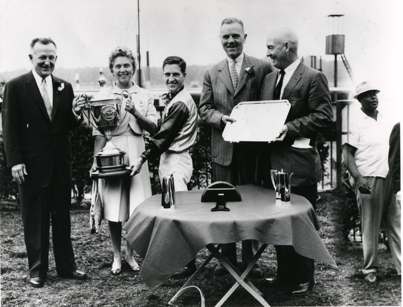Jockey Bobby Ussery at a trophy presentation after winning a race (Mike Sirico/Museum Collection)