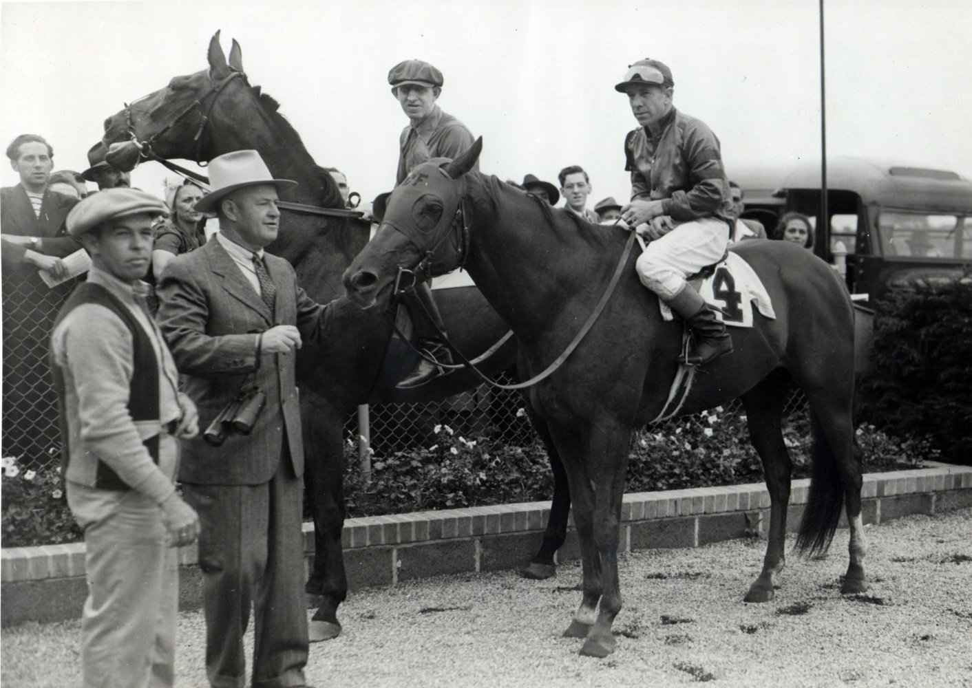 George Woolf and Whirlaway in the winner's circle in 1942 (Museum Collection)