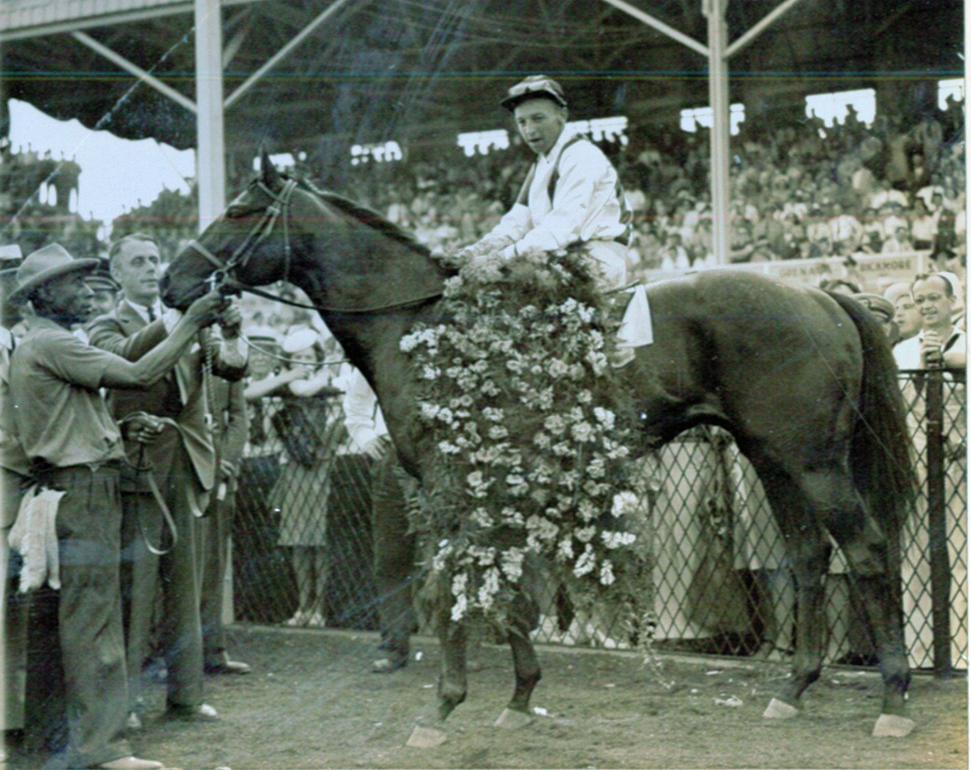 Wayne Wright aboard Polynesian after winning the 1945 Preakness at Pimlico (Bert Morgan/Museum Collection)