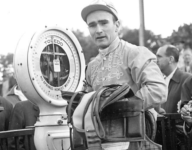 Frank Dooley Adams weighing in after a race at Belmont Park, October 1955 (Keeneland Library Morgan Collection/Museum Collection)