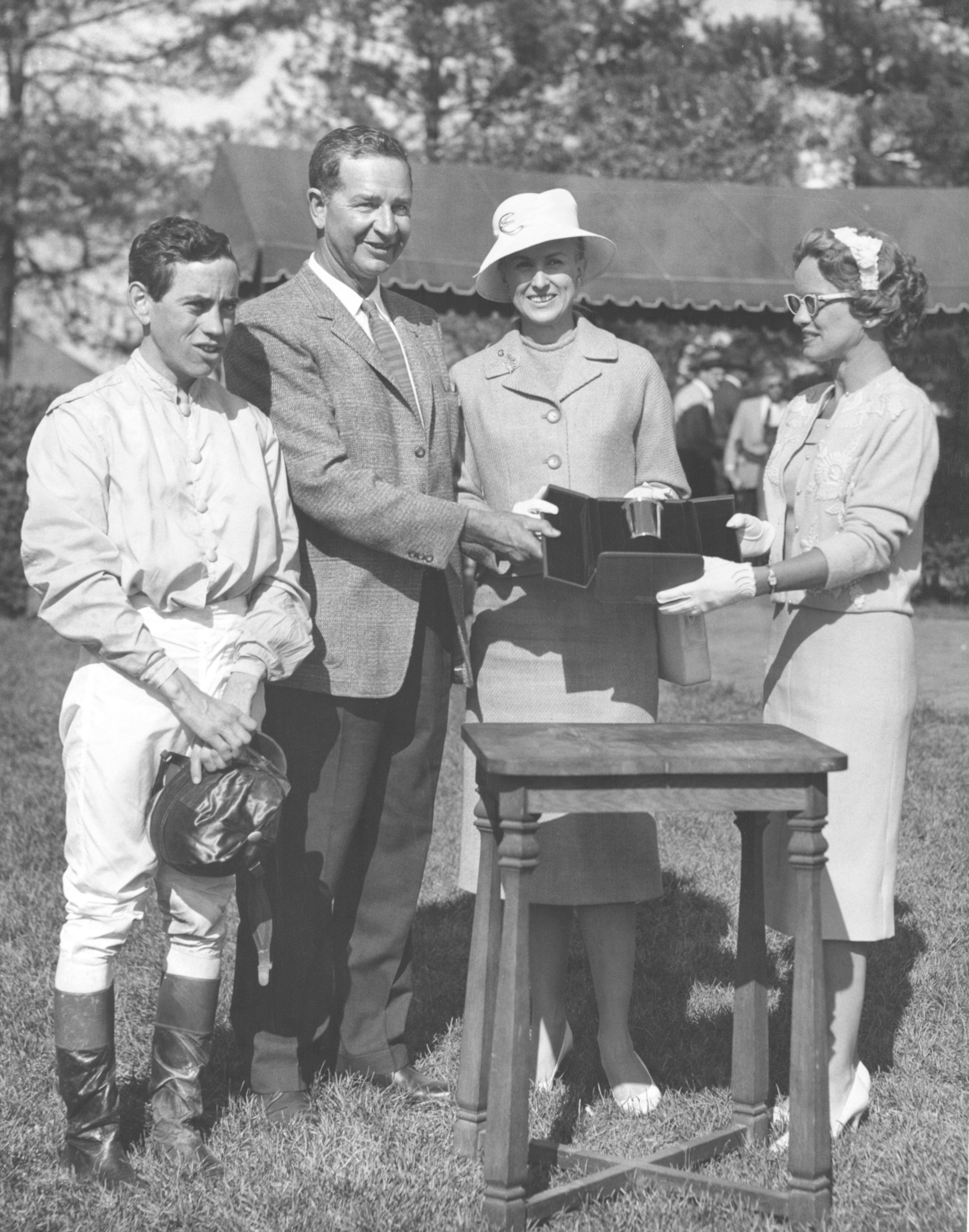 From left, John Rotz, C. V. Whitney, Marylou Whitney, and Mrs. Len Shouse III at Keeneland, 1960 (Keeneland Library)