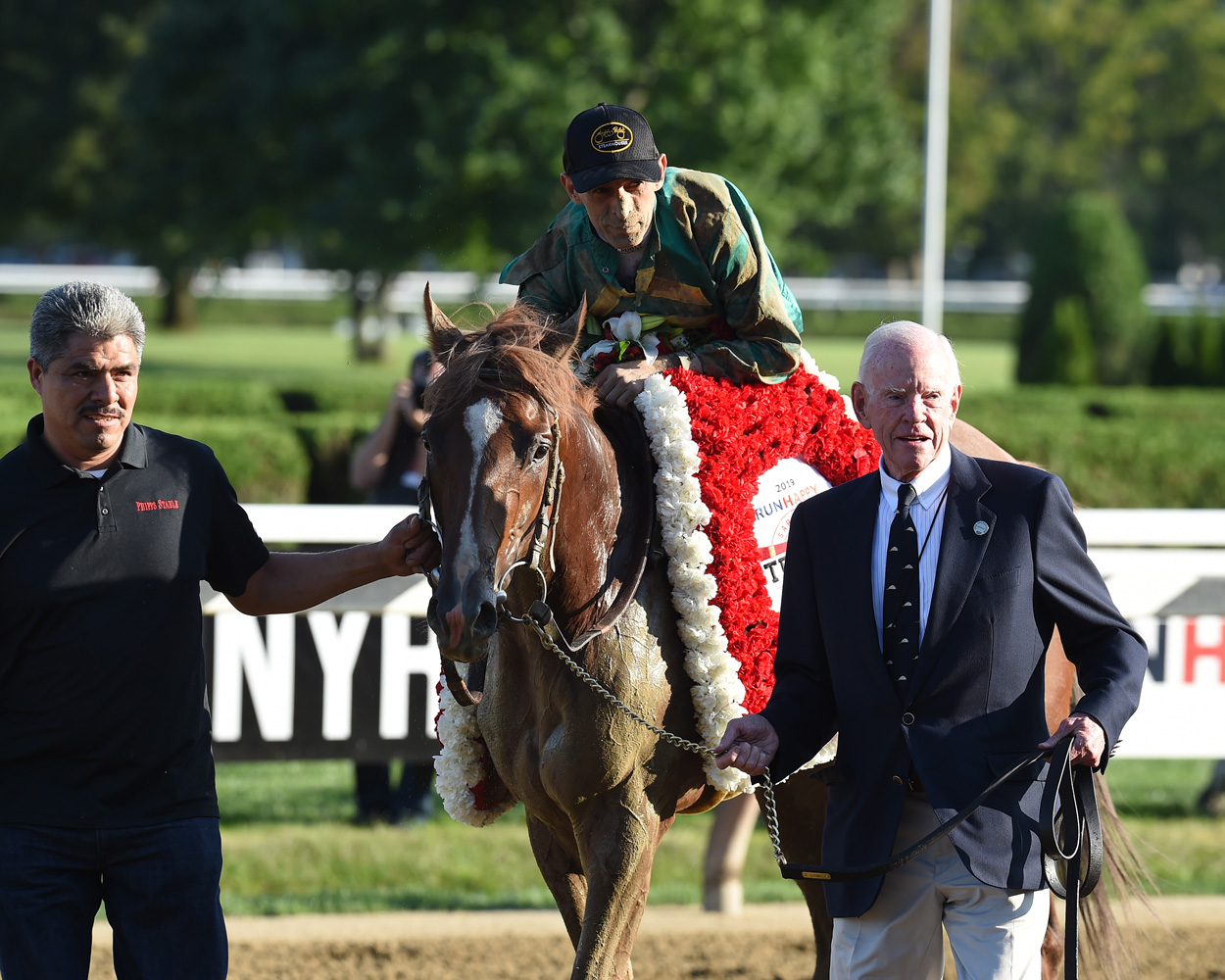 William S. Farish leads in Code of Honor (John Velazquez up) after winning the 2019 Travers Stakes at Saratoga (NYRA)