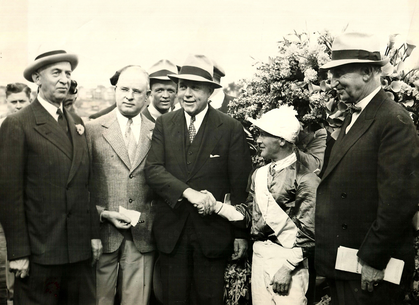 V. C. Wetmore, James H. Connors, Hal Price Headley, Nick Wall, and Charles F. Adams at the 1938 Massachusetts Handicap (Courtesy of Ken Grayson)