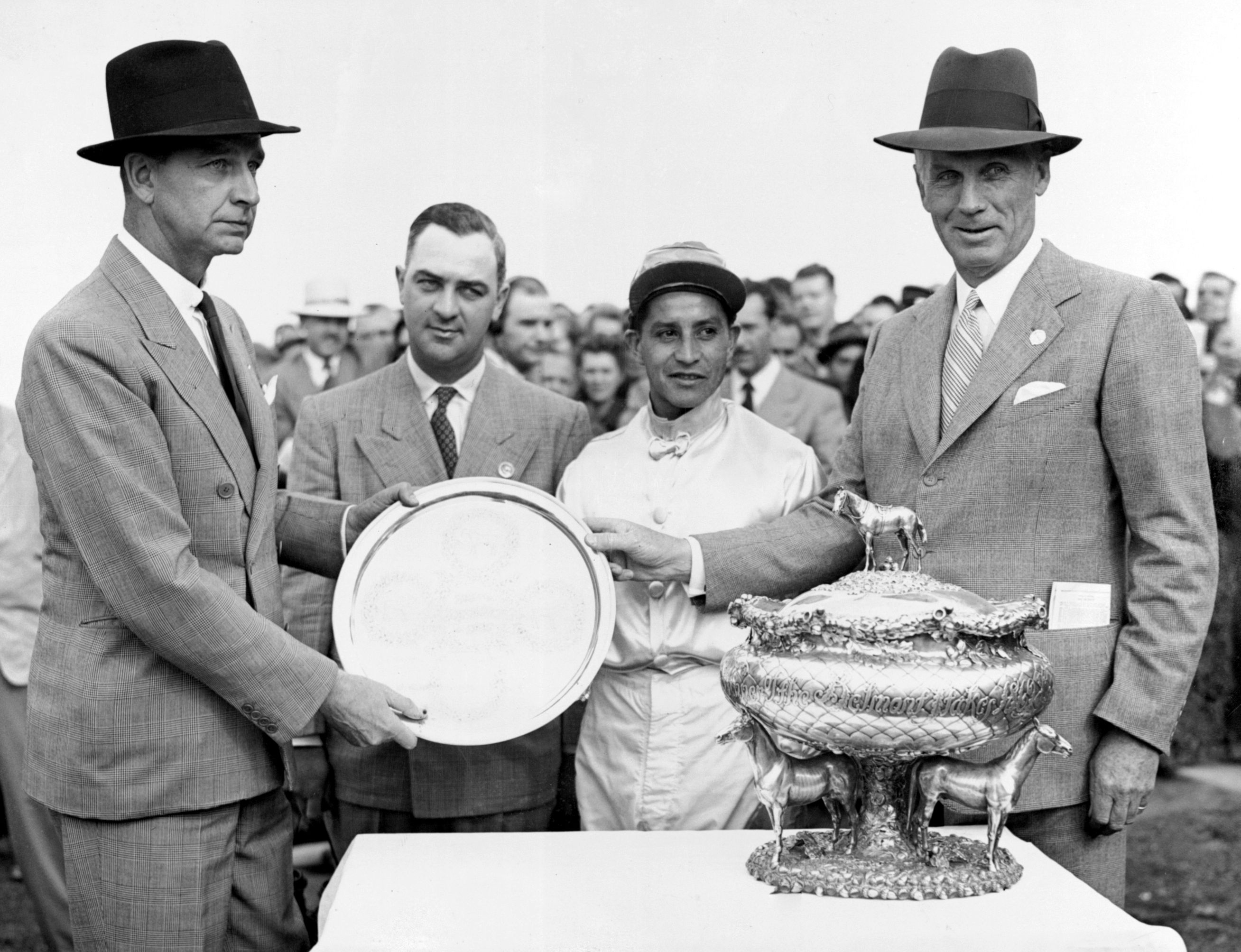 From left, C. V. Whitney, Syl Veitch, Ruperto Donoso, and George D. Widener, 1947 Belmont Stakes presentation (Keeneland Library Morgan Collection)