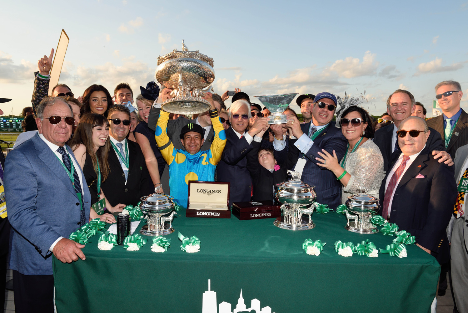 Bob Baffert and the winning connections of American Pharoah during the 2015 Belmont Stakes and Triple Crown trophy presentation (NYRA)