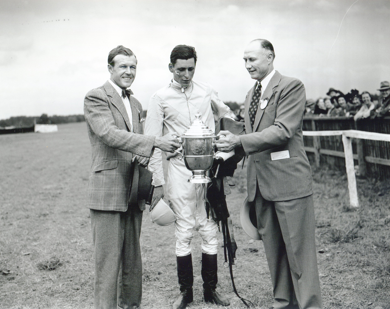 Trainer W. Burling Cocks, jockey D.M. Smitwick, and South Carolina Governor J. Strom Thurmond at the 1948 Carolina Cup trophy presentation at Camden (Keeneland Library Morgan Collection/Museum Collection)
