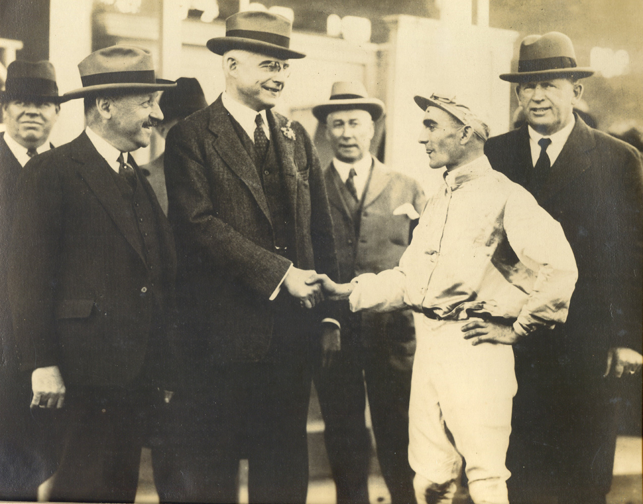 Owner Walter J. Salmon, Maryland Governor Albert Ritchie, jockey John Maiben, and trainer T. J. Healey celebrating their 1926 Preakness victory with Display (Drucker and Company/Museum Collection)