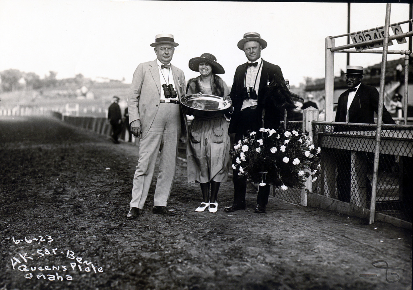 Ben Jones (on right) during the trophy presentation for the Queens Plate at Ak-Sar-Ben in June 1923 (Museum Collection)