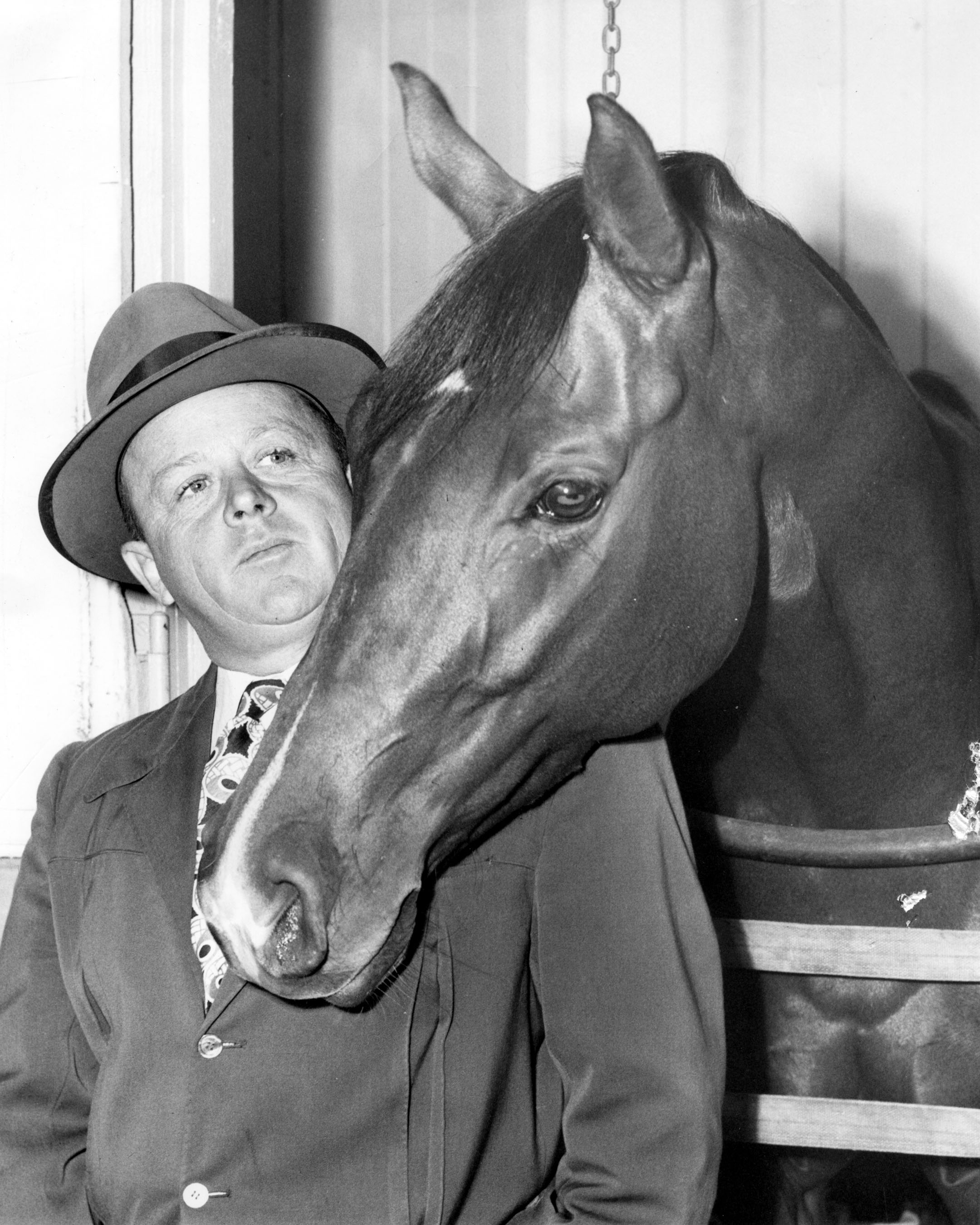 Jimmy Jones with Two Lea, one of the Hall of Fame horses he conditioned for Calumet Farm (Museum Collection)