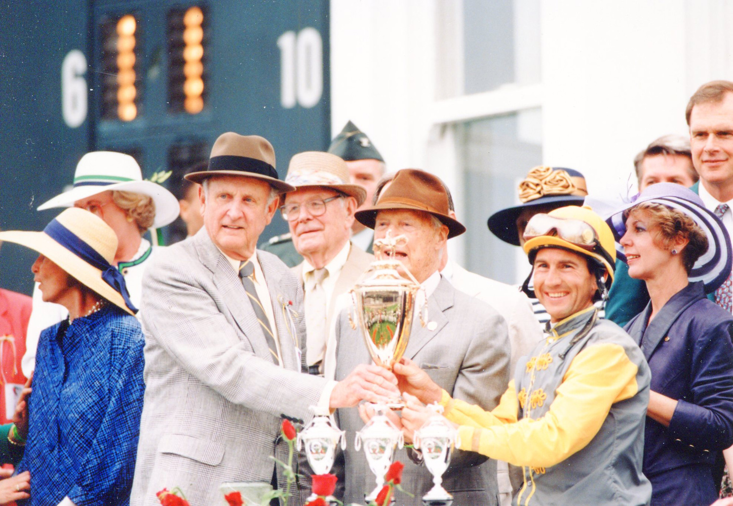 Mack Miller, Paul Mellon, and Jerry Bailey at the 1993 Kentucky Derby trophy presentation (Museum Collection)